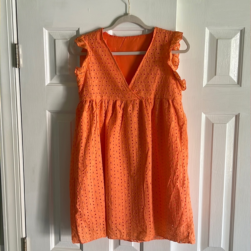 Super cute, NWOT, orange eyelet mini-dress.